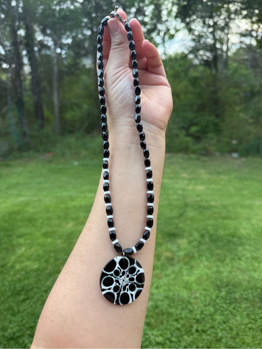 Black and White Beaded Necklace with Abstract Pendant